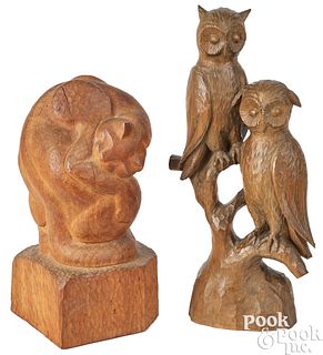 Two carved pine figures of two owls and a cat