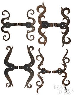 Four pairs of wrought iron ram's horn hinges