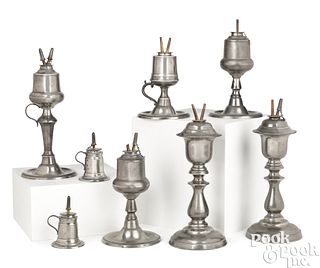 Eight pewter whale oil lamps, 19th c.