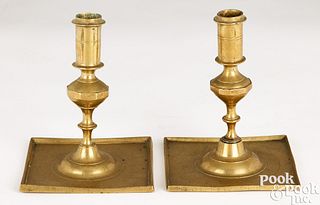 Pair of platform base brass candlesticks, 18th c.