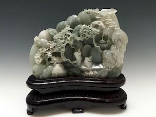 AN OLIVE-GREEN JADE MOUNTIAN