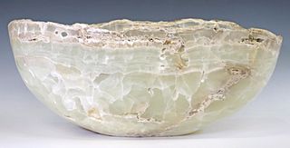 LARGE GEOLOGICAL NATURAL EDGE ONYX BOWL, 25.5"W