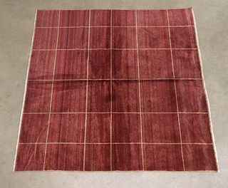 HAND-TIED RED & GOLD RUG, 6'1" X 6'4.25