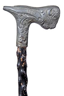 8. Pan-Am Exposition Pipe Cane – Dated 1901- A cast pewter buffalo handle which doubles as a pipe with a clay bowl, the top
