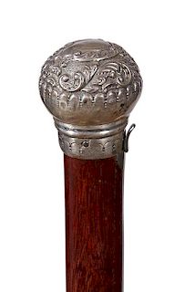 60. Fan System Cane- Ca. 1900- An ornate silver handle which has unreadable British hallmarks, the fan mechanism is spring lo