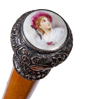 55. Victorian Dress Cane- Ca. 1870- A beautiful ornate silver handle with a photographic porcelain cartouche of a Victorian l