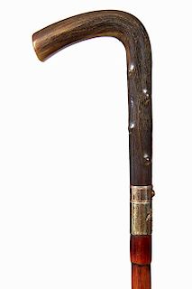 100. Sword Cane- Ca. 1880- A twigspur horn handle, a 24 ¼” four sided blued and etched blade with a push button locking me