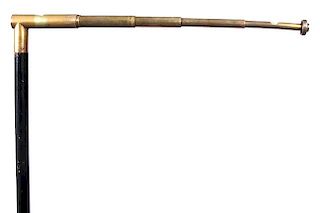 101. Level System Cane- Ca. 1910- A brass handle which has a telescoping five draw level which is 17” long (glass bubble is