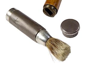 103. Shaving Brush System Cane- Ca. 1890- A British hallmarked shaving cane which includes a silver mounted brush and a cubby