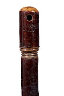 137. Pipe System Cane- Early 20th Century- A full bark handle which doubles as the bowl of the pipe, copper collars, pipe att
