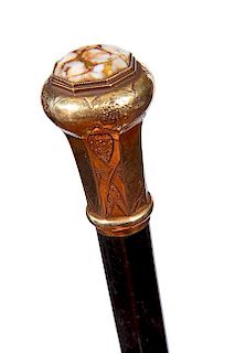 141. Gold Quartz Presentation Cane- Ca. 1855- This cane was presented to “George H. Thacher,” the gold quartz atop the ha