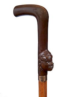 162. Blackamoor Sword Cane- Ca. 1885- A nice gutta percha handle which has an African gentlemen with large earrings and two c