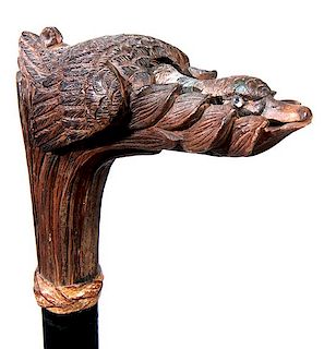 166. Mallard Duck Automation Cane- Ca. 1900- A whimsical Black Forrest carved cane handle, which has a paint decorated Drake 