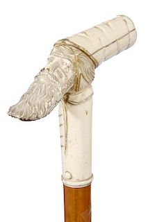191. Toledo Bone Sword Cane- Ca. 1880- A three piece bone handle of a gentleman with a long beard, a push button lock mechani