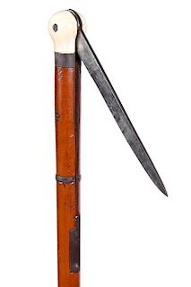 252. Switchblade Knife Cane – Ca. 1810 – A rarely seen most desirable example with hippo teeth handles and iron attachmen