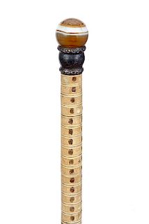 257. Agate/Vertebrae Dress Cane – Ca. 1890 – A caramel-colored agate as a handle, ornate silver metal collar, undamaged v