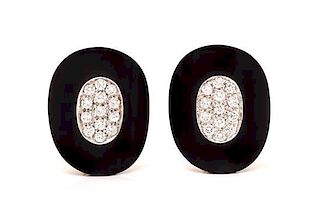 A Pair of 18 Karat Yellow Gold, Onyx and Diamond Earclips, 22.00 dwts.