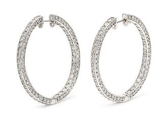 A Pair of White Gold and Diamond Hoop Earrings, 7.80 dwts.