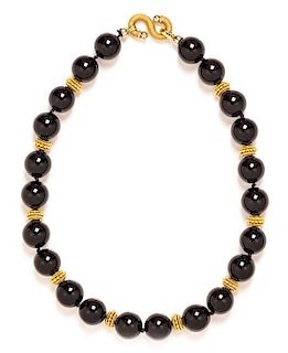 An 18 Karat Yellow Gold and Onyx Bead Necklace, 102.50 dwts.