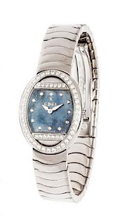 An 18 Karat White Gold, Diamond and Mother-of-Pearl "Satya" Wristwatch, Ebel, 62.10 dwts.