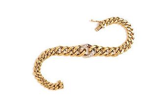 An 18 Karat Bicolor Gold and Diamond Graduated Curb Link Bracelet, 20.40 dwts.