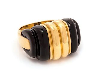 A 18 Karat Yellow Gold and Onyx Ring, 10.60 dwts.