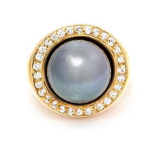 * An 18 Karat Yellow Gold, Cultured Tahitian Pearl and Diamond Ring, 11.40 dwts.