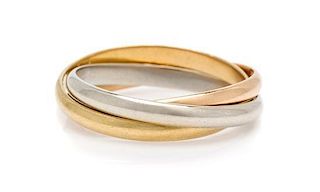 * An 18 Karat Tricolor Gold Trinity Ring, Cartier, 3.30 dwts.