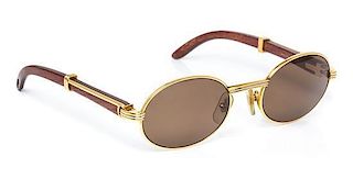 * A Pair of Gold Plated and Wood Sunglasses, Cartier