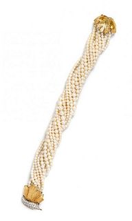 A Bicolor Gold, Diamond and Multistrand Cultured Pearl Torsade Bracelet, 36.20 dwts.