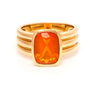 An 18 Karat Yellow Gold and Fire Opal Ring, Barry Brinker, 10.40 dwts.