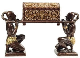 PARCEL GILT CHEST SUPPORTED BY BRONZE FIGURES