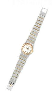 * A Stainless Steel, 14 Karat Yellow Gold and Diamond Wristwatch, Concord,