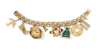 * A Gold Filled Charm Bracelet with Eight Attached Charms, 60.50 dwts.