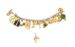 A Yellow Gold Charm Bracelet with Seventeen Attached Charms, 47.20 dwts.