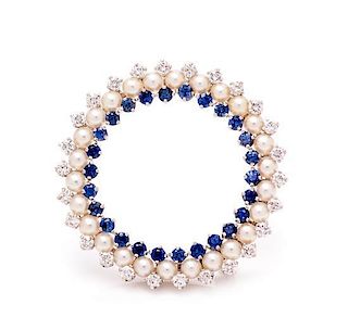 A White Gold, Cultured Seed Pearl, Sapphire and Diamond Circle Brooch, 4.40 dwts.