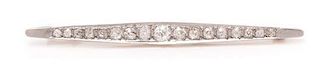 * A Platinum Topped Gold and Diamond Bar Brooch, French, 4.30 dwts.