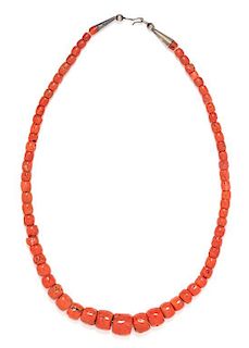 * A Single Strand Orange-Red Coral Graduated Bead Necklace,