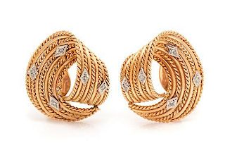 * A Collection of Yellow Gold Swirl Earclips, 26.90 dwts.