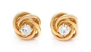 A Pair of 14 Karat Yellow Gold and Diamond Stud Earrings, 1.90 dwts.
