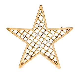 A Yellow Gold and Diamond Star Brooch, 9.20 dwts.