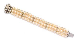 A White Gold, Diamond and Cultured Pearl Multistrand Bracelet, 34.00 dwts.