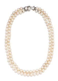 * A 14 Karat White Gold, Diamond and Cultured Pearl Double Strand Necklace, 31.00 dwts.