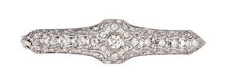 * An Art Deco Platinum and Diamond Pendant/Brooch, 10.20 dwts.