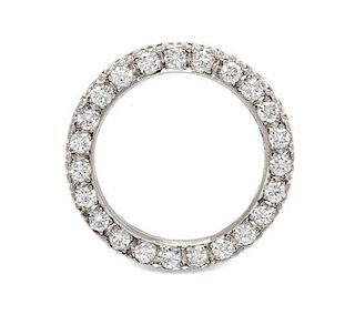 * A White Gold and Diamond Circle Brooch, 2.25 dwts.