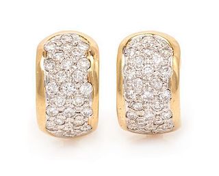 A Pair of 14 Karat Yellow Gold and Diamond Earclips, 7.00 dwts.