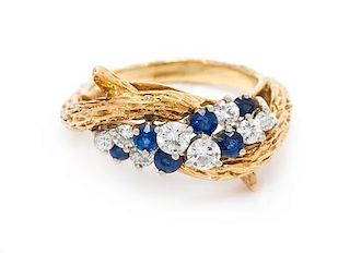 An 18 Karat Yellow Gold, Diamond and Sapphire Ring, 4.20 dwts.