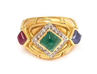 * An 18 Karat Yellow Gold, Emerald, Ruby, Sapphire and Diamond Ring, Cassis, 6.60 dwts.