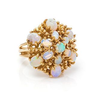 A 14 Karat Yellow Gold and Opal Ring, 8.70 dwts.