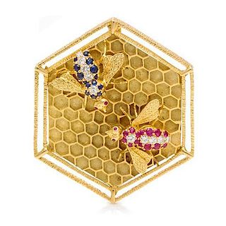 * An 18 Karat Yellow Gold, Ruby, Sapphire and Diamond Bee Motif Pendant/Brooch, 26.55 dwts.